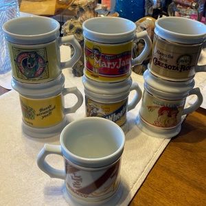 The Corner Store Porcelain Mugs. Set of 7. NWOT. Collector’s Edition 1984/1985